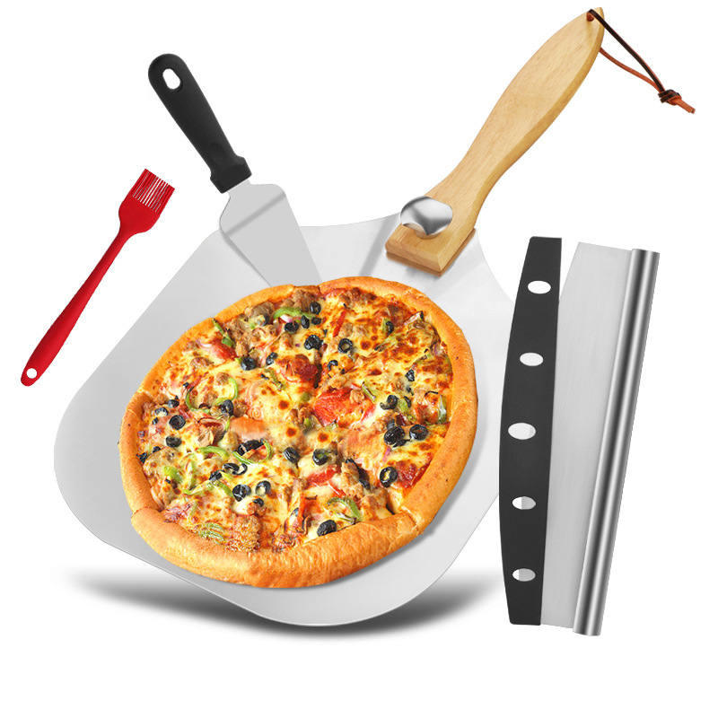 Aluminum pizza peel with pizza, 12x14 inch